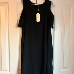 Nemidor Dress Size 22 New with Tags
Cut outs on sleeve